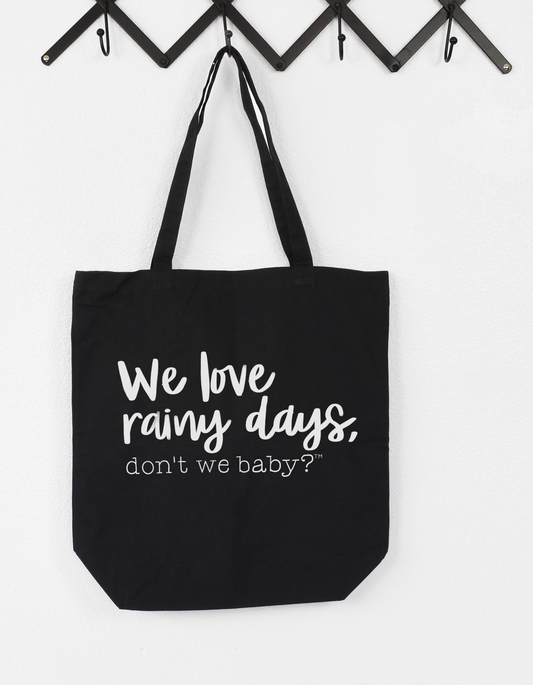 We love rainy days, don’t we baby?® Canvas Tote Bag