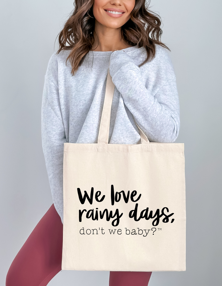 We love rainy days, don’t we baby?™ Canvas Tote Bag