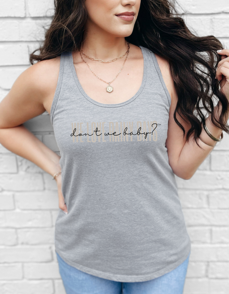 We love rainy days, don’t we baby?™ Racerback Tank